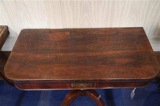 A pair of Regency rosewood card tables, W.2ft 11in. D.1ft 5.5in. H.2ft 4in.
